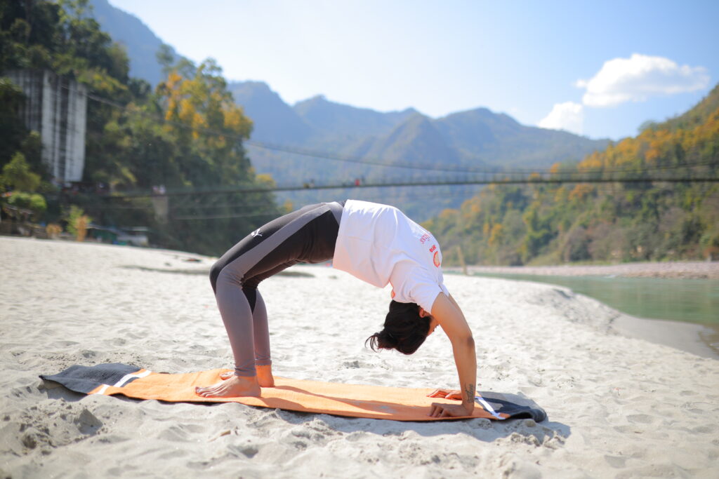 Yoga Pose Demonstration at Art of Yog