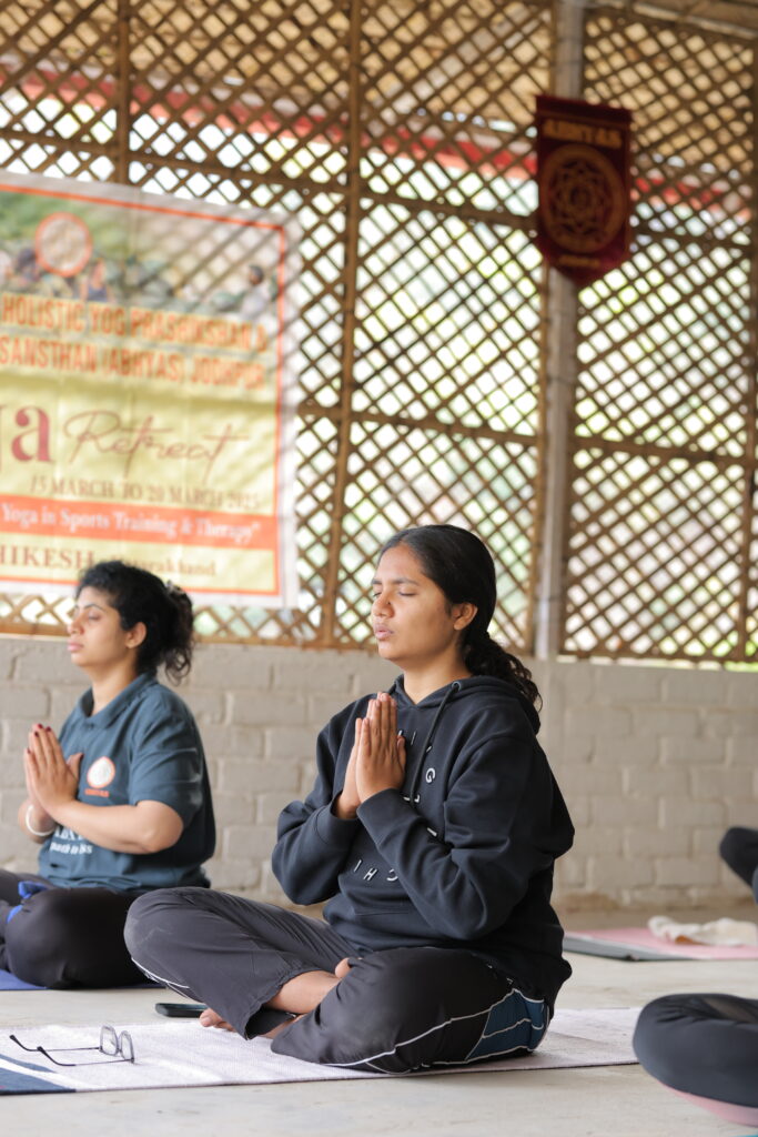 Meditation class at Art of Yog studio with participants in calm posture