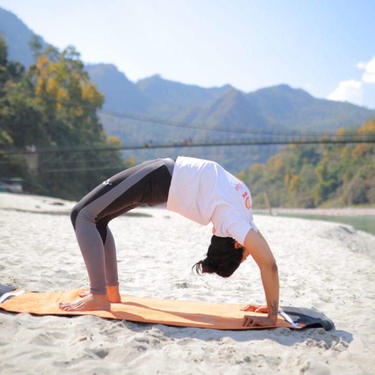 Yoga Pose Demonstration at Art of Yog